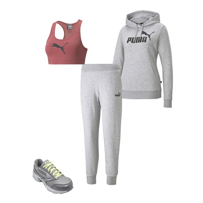 Puma Training mid support 4 Keeps sports bra in white - ShopStyle