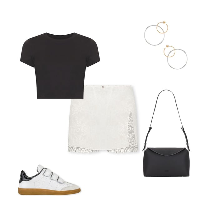 Cuts CAMISETA RECORTADA TOMBOY en Black REVOLVE