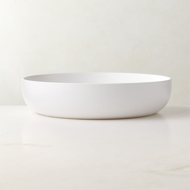 Large white outlet serving bowls