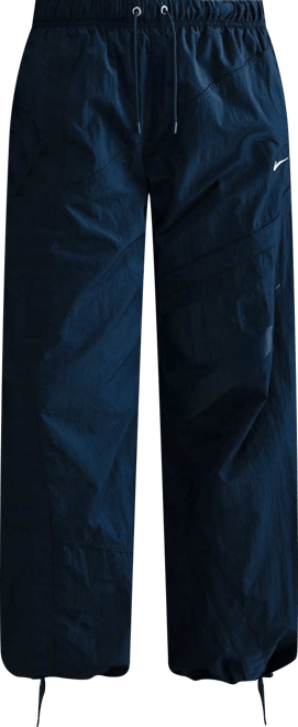 Nike Sportswear Pants de tejido Woven de tiro medio holgados con dobladillo abierto para mujer