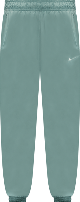 Nike Sportswear Classic Wovens Joggers de tiro medio holgados con protección contra los rayos UV para mujer