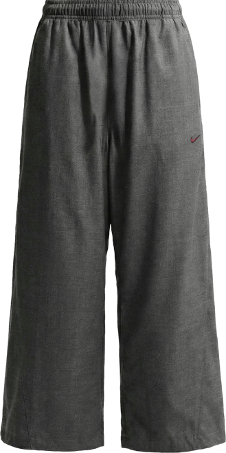 Nike Sportswear Pants de tejido Woven de tiro medio oversized para mujer