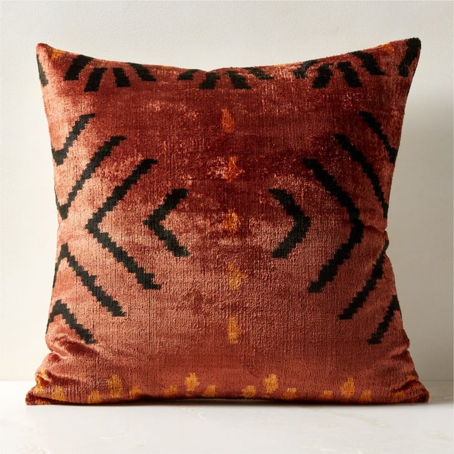 Red and 2025 orange throw pillows